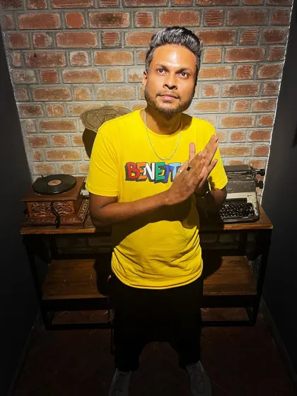 A relaxed and confident pose. You can catch me spinning at The Bier Library in Koramangala every weekend.