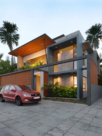 A contemporary design that uses a frame-like structure and terracotta jali screens to create a visually separated yet connected facade.