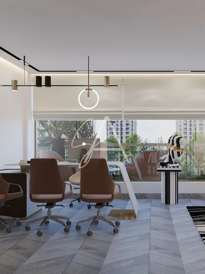 A modern executive office with a view. The glass wall provides an expansive look at the greenery outside, while the interior remains sleek and professional with contemporary furniture and lighting.