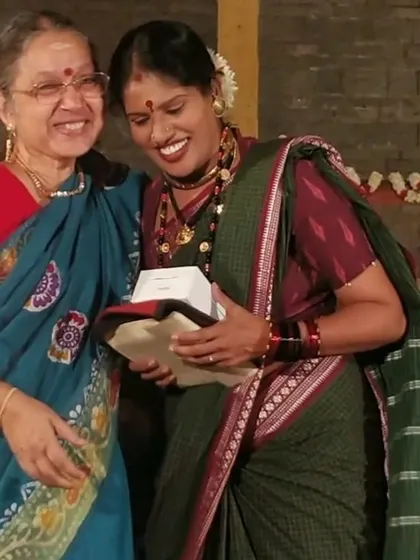 A moment of appreciation after a Pournami performance. Our events foster a warm and supportive community, where artists and audience members share in the spiritual and artistic experience.