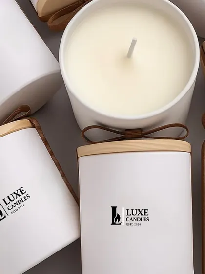 These minimalist white jar candles with wooden lids are a versatile option for any decor style. The vanilla fragrance is a timeless classic.