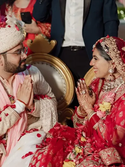 A moment of prayer and gratitude during the wedding ceremony. This image captures the spiritual and emotional depth of the day.