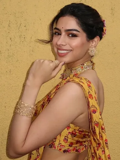 A joyful shot of Khushi Kapoor wearing my gold rose tops and cuff. These pieces are designed to be versatile, perfect for both traditional and contemporary outfits.