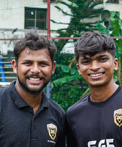 A moment of camaraderie between two of our coaches during a workshop. A strong coaching team builds a strong academy.