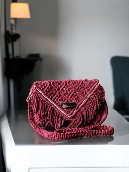 Styled on a console table, this clutch shows how it can be a beautiful art piece even when you're not carrying it.