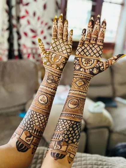 Another angle of the personalized engagement mehendi, highlighting the intricate details and custom elements.