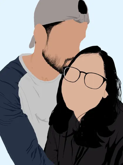 A close-up faceless portrait that captures a sweet, affectionate moment between a couple.