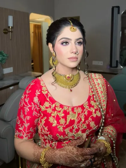 A candid shot showing the soft, diffused eyeshadow and perfectly blended skin work. The look is elegant and photographs beautifully from all angles.
