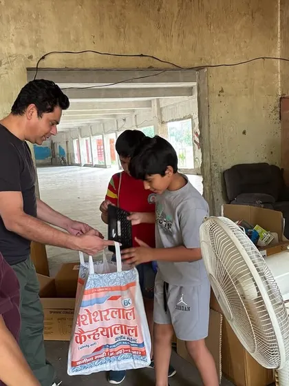 Even the youngest residents get involved, helping to collect and sort dry waste during the community drive in Mayfield Gardens.