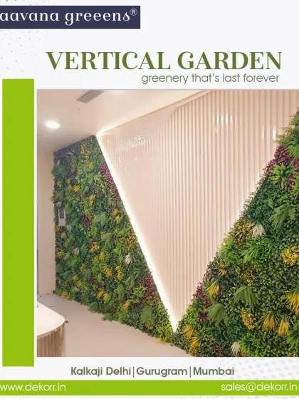 Here, I combined a modern, white fluted panel wall with a custom-shaped artificial vertical garden. The contrast between the clean lines of the panel and the organic texture of the greenery creates a striking and contemporary design feature in this commercial space.