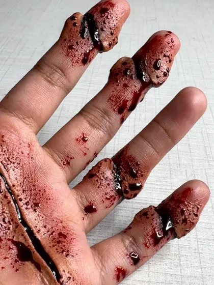 A still image of my SFX hand wound makeup. This is the kind of prosthetic work I teach in my specialized SFX classes.
