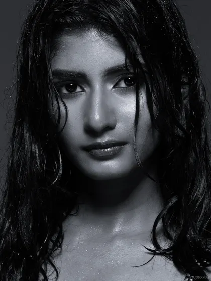 Another powerful black and white close-up from the wet look series, capturing a raw and direct gaze.