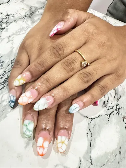 Another look at the beautiful multi-colored blooming gel effect, creating a soft, floral pattern.
