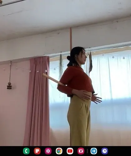 Posture correction can be done anywhere. In this online session, I am guiding a student using a simple prop to bring awareness to her spinal alignment, helping her build better habits even while at home.