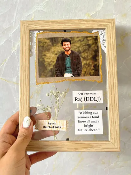 A look at one of the 20 vintage frames we sent to Noida for a farewell. Each one was personalized with a photo and custom messages.