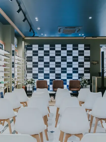 We set up a presentation area for the GKB relaunch, using their branded checkerboard pattern as a backdrop. The clean white chairs and subtle floral accents created a professional yet comfortable setting for their press and community announcements.