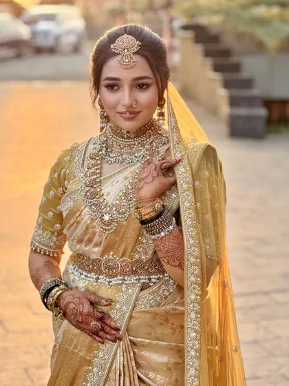 Nischaya glowing in the soft light, a perfect example of a timeless South Indian bride ready for her destination wedding.