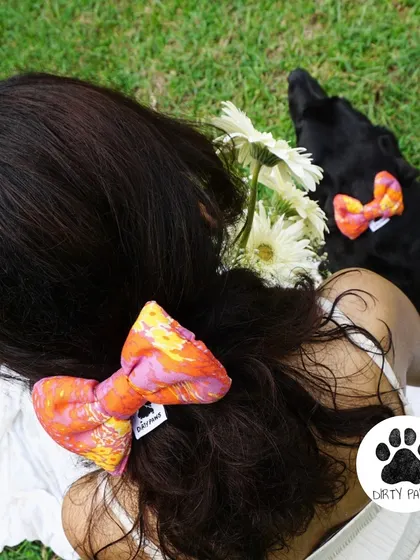 This is what it's all about. A quiet moment with my best friend, sharing a little bit of style. I started this brand to celebrate this exact feeling, and our matching bow sets are made for moments just like this.