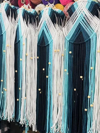 My workshop filled with dreamcatchers for a corporate client. I ensure every piece meets my high standards of quality.