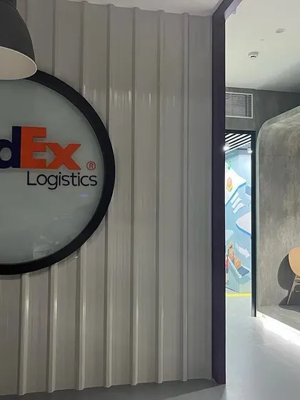 The finished reception for FedEx in Hyderabad, where I transferred ideas from the studio to the final space. The design uses industrial materials to reflect a company that masters the transfer of shipments worldwide.