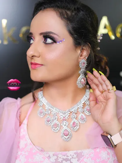 A side profile of the pink-themed look, showing how the makeup, jewellery, and outfit all work together. This is a key part of the training I provide.