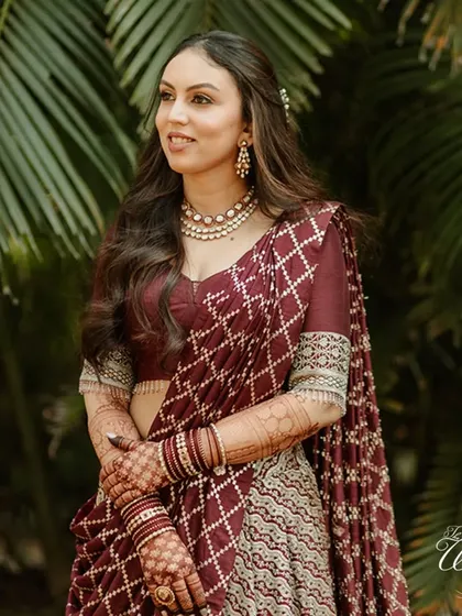 The bride looking elegant and radiant at her Mehendi ceremony.