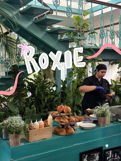 A visit to Roxie. The doodles highlight the name of the cafe and add a touch of floral whimsy to the scene.