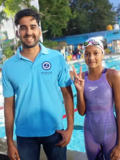 Rishmika R with her coach.