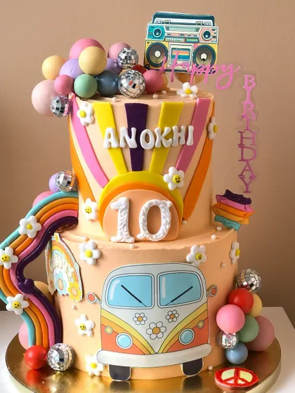 A full view of the groovy 70s-inspired cake, perfect for a themed party.