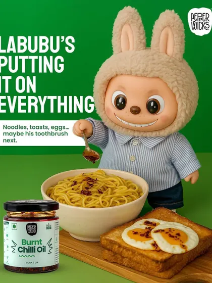 Another scene from our Labubu campaign, showing the character enjoying Burnt Chilli Oil with noodles and toast. This series tells a story, keeping the audience engaged and coming back for more.