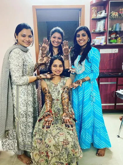 A happy bride with her bride tribe. We love being a part of these joyful moments and making sure everyone's hands are beautifully decorated.