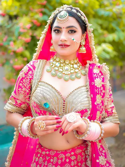 This shot showcases the full bridal look, from the detailed blouse to the bangles. I used my Canon R6 with a 50mm 1.8 lens to create that beautiful background blur.