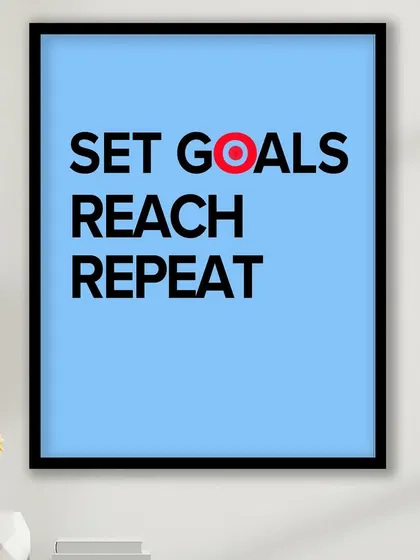 "Set Goals, Reach, Repeat." This vibrant blue and red typographic print is a perfect visual motivator for any workspace or gym, reminding you to stay focused on the cycle of achievement.
