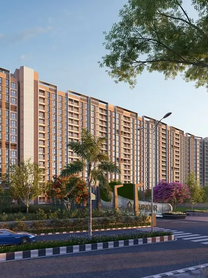 A daytime render of the Kohinoor Uptown residential complex. This view highlights the clean lines and modern aesthetic of the buildings, surrounded by planned green spaces that promote a healthy community lifestyle.