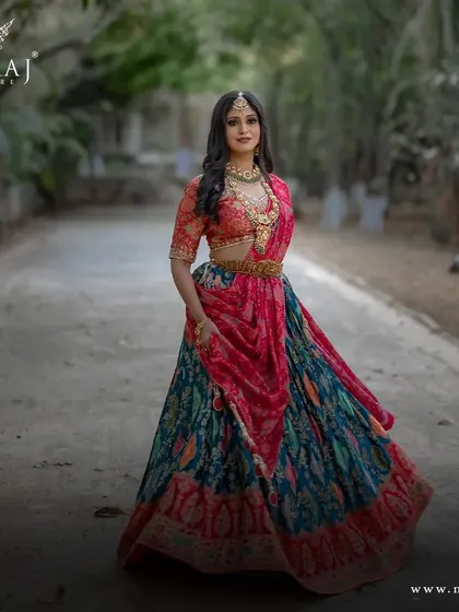 Another full view of the multi-colored banarasi lehenga, showcasing its beautiful drape and rich colors.