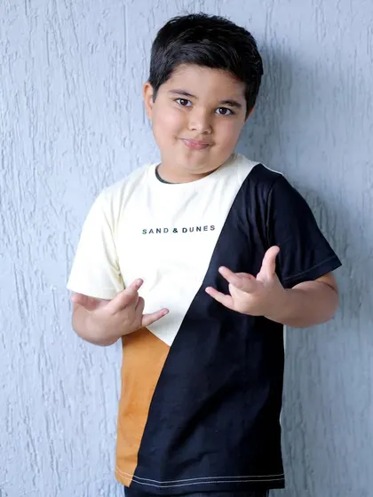 The birthday boy showing off his cool side with a fun pose for the camera. I always encourage kids to be themselves during their birthday photoshoot.