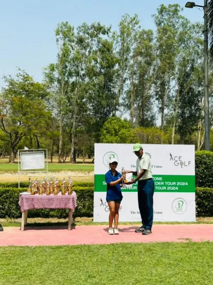 Unnati Singh with her trophy for a second runner-up finish at the same event.