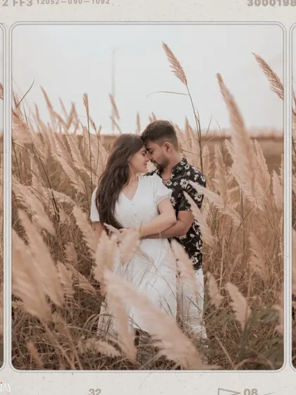 A wide shot of the couple in the field, edited with a vintage film effect.