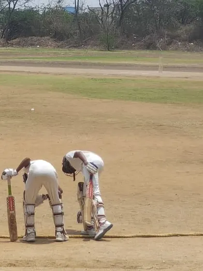 Two batsmen taking their guard on a matting wicket during the Hyderabad tour.