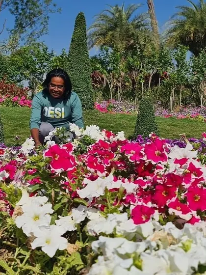 In my element, surrounded by a field of red and white petunias. The variety of colors and patterns in nature is endless.