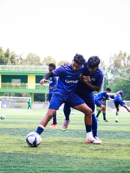 The intensity of a training match. Our players battle for possession, sharpening their skills and physical strength in preparation for the Super Division season.