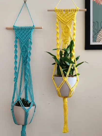 Another view of the turquoise and yellow plant hangers.