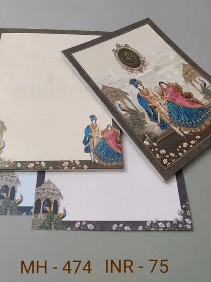 This card features a royal couple surrounded by peacocks against a palace backdrop. The design is rich in color and traditional motifs, perfect for a vibrant wedding.