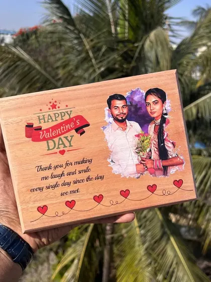 A wooden photo plaque for Valentine's Day, printed with a couple's photo and a sweet, personalized message.