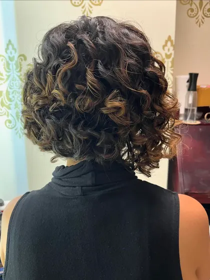 A curl transformation for Jeshvi, with subtle highlights to add dimension.