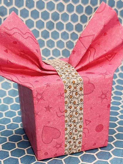 A creatively wrapped gift box. Our gift packing workshops teach you unique and beautiful ways to present your gifts for any occasion.