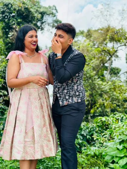 A fun, candid moment from a pre-wedding shoot. Our client is glowing in her custom dress.