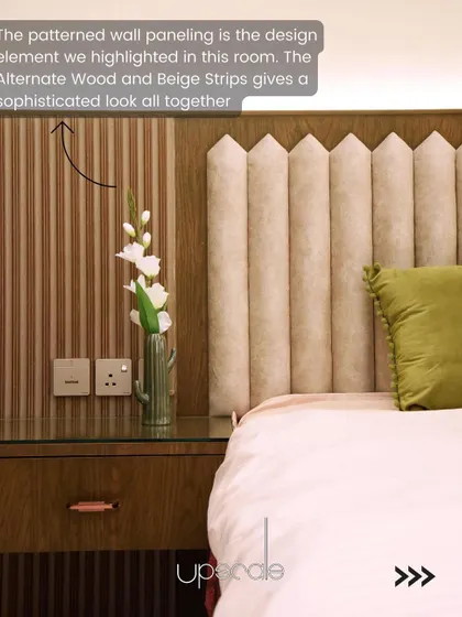 This annotated image highlights the patterned wall paneling, where alternating strips of wood and beige create a sophisticated and textured backdrop.