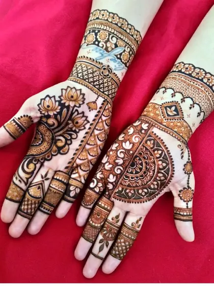 This gallery showcases a variety of my traditional designs. You'll find classic elements like peacocks, elephants, lotuses, and intricate jaali (net) patterns, all expertly crafted to create timeless beauty.