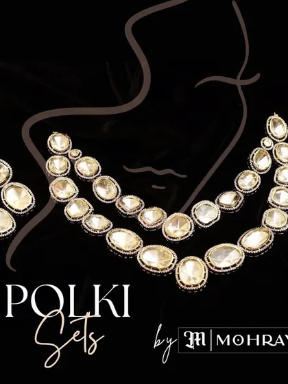 An advertisement graphic showcasing the beauty of our Polki sets, featuring a classic multi-layered necklace with large uncut stones.
